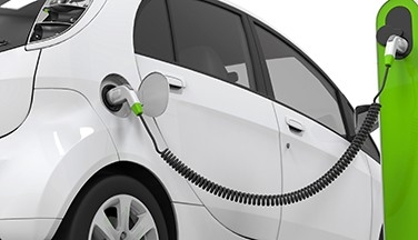 Electric vehicle being charged.